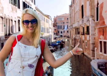 Elegant beautiful girl in Venice